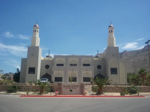 The Islamic Center of El Paso building and sign beneath a clear sky.